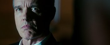 Movie still from “The Purge: Election Year” (2016), directed by James DeMonaco – A man's face in a dark room; Extreme Close Up shot, Low angle