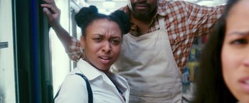 Movie still from “The Purge: Election Year” (2016), directed by James DeMonaco – A man and a woman standing next to each other; Close Up shot, Low angle