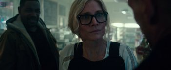 Movie still from “The Purge: Election Year” (2016), directed by James DeMonaco – A person wearing glasses; Close Up shot, Over the shoulder angle
