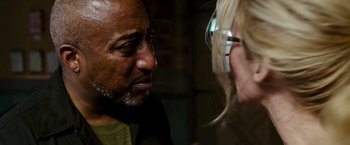 Movie still from “The Purge: Election Year” (2016), directed by James DeMonaco – A man and a woman talking to each other; Close Up shot, Over the shoulder angle