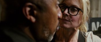 Movie still from “The Purge: Election Year” (2016), directed by James DeMonaco – A man and a woman kissing in front of a mirror; Close Up shot, Over the shoulder angle