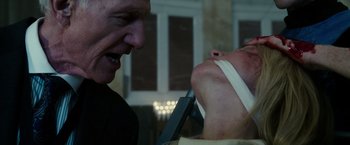 Movie still from “The Purge: Election Year” (2016), directed by James DeMonaco – A man and a woman with bandages on their faces; Close Up shot, Low angle