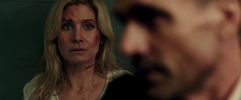 Movie still from “The Purge: Election Year” (2016), directed by James DeMonaco – A person looking at the camera; Close Up shot, Over the shoulder angle