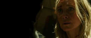 Movie still from “The Purge: Election Year” (2016), directed by James DeMonaco – A person looking at the camera; Close Up shot, Over the shoulder angle