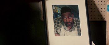 Movie still from “The Purge: Election Year” (2016), directed by James DeMonaco – A picture of a man with a beard and an apron; Extreme Close Up shot, High angle