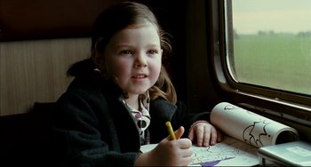 Movie still from “The Reader” (2008), directed by Stephen Daldry – A little girl sitting in front of a window with a pencil; Close Up shot, High angle