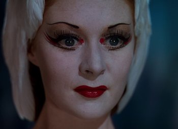 Movie still from “The Red Shoes” (1948), directed by Michael Powell – A person with makeup on; Close Up shot, High angle