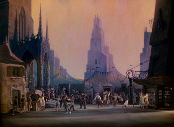 Movie still from “The Red Shoes” (1948), directed by Michael Powell – An oil painting of a crowded city street; Extreme Wide shot, High angle