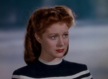 Movie still from “The Red Shoes” (1948), directed by Michael Powell – A person wearing a striped shirt; Close Up shot, High angle