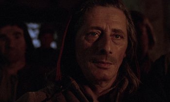 Movie still from “The Return of Martin Guerre” (1982), directed by Daniel Vigne – A person with long brown hair; Close Up shot, Over the shoulder angle