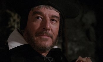 Movie still from “The Return of Martin Guerre” (1982), directed by Daniel Vigne – A person wearing a hat; Close Up shot, Over the shoulder angle
