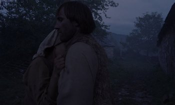 Movie still from “The Return of Martin Guerre” (1982), directed by Daniel Vigne – A man and a woman in the woods at night; Medium shot, Low angle