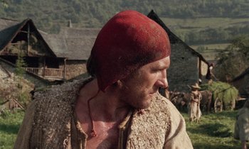 Movie still from “The Return of Martin Guerre” (1982), directed by Daniel Vigne – A person wearing a red hat; Close Up shot, Low angle