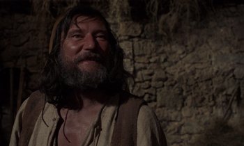 Movie still from “The Return of Martin Guerre” (1982), directed by Daniel Vigne – A man with long hair and a long beard; Close Up shot, Low angle