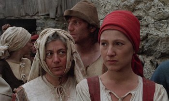 Movie still from “The Return of Martin Guerre” (1982), directed by Daniel Vigne – A group of people standing next to each other; Close Up shot, Low angle