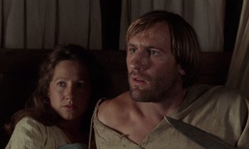 Movie still from “The Return of Martin Guerre” (1982), directed by Daniel Vigne – A man and a woman are sitting on a couch; Close Up shot, Low angle