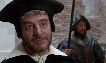 Movie still from “The Return of Martin Guerre” (1982), directed by Daniel Vigne – A person wearing a hat; Close Up shot, Over the shoulder angle