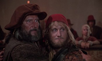 Movie still from “The Return of Martin Guerre” (1982), directed by Daniel Vigne – A couple of men standing next to each other; Close Up shot, Low angle