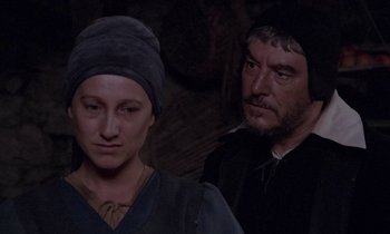 Movie still from “The Return of Martin Guerre” (1982), directed by Daniel Vigne – A man and a woman standing next to each other; Close Up shot, Over the shoulder angle