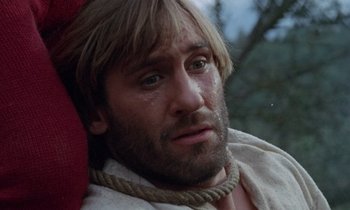 Movie still from “The Return of Martin Guerre” (1982), directed by Daniel Vigne – A person with a rope around his neck; Close Up shot, Low angle