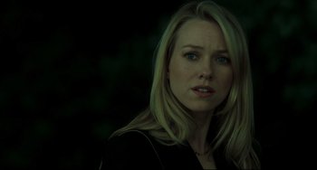 Movie still from “The Ring” (2002), directed by Gore Verbinski – A woman with blonde hair is looking at the camera; Close Up shot, Over the shoulder angle