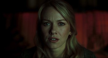 Movie still from “The Ring” (2002), directed by Gore Verbinski – A person with long blonde hair; Close Up shot, Over the shoulder angle