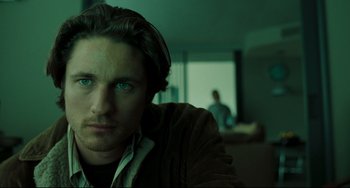 Movie still from “The Ring” (2002), directed by Gore Verbinski – A person wearing a sweater; Close Up shot, Over the shoulder angle