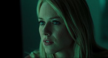 Movie still from “The Ring” (2002), directed by Gore Verbinski – A beautiful blonde woman with blue eyes looking at the camera; Close Up shot, Low angle