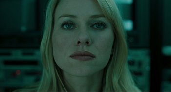 Movie still from “The Ring” (2002), directed by Gore Verbinski – A woman's face in a dark room; Close Up shot, Low angle