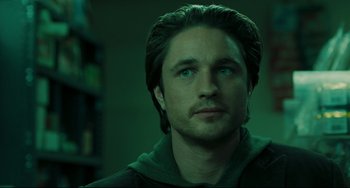 Movie still from “The Ring” (2002), directed by Gore Verbinski – A person wearing a hooded sweatshirt; Close Up shot, Over the shoulder angle