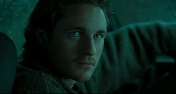 Movie still from “The Ring” (2002), directed by Gore Verbinski – A man's face in the dark; Close Up shot, High angle