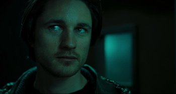 Movie still from “The Ring” (2002), directed by Gore Verbinski – A person wearing a black shirt; Close Up shot, Low angle