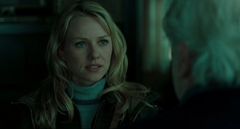 Movie still from “The Ring” (2002), directed by Gore Verbinski – A woman with blonde hair wearing a blue sweater; Close Up shot, Over the shoulder angle