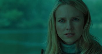 Movie still from “The Ring” (2002), directed by Gore Verbinski – A person with long blonde hair; Close Up shot, Over the shoulder angle