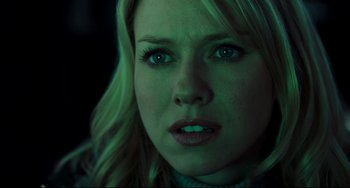 Movie still from “The Ring” (2002), directed by Gore Verbinski – A woman's face in green light; Close Up shot, Over the shoulder angle