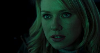 Movie still from “The Ring” (2002), directed by Gore Verbinski – A woman's face in the dark; Close Up shot, Over the shoulder angle