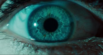 Movie still from “The Ring” (2002), directed by Gore Verbinski – A person's eye with a blue tint; Extreme Close Up shot, Overhead angle