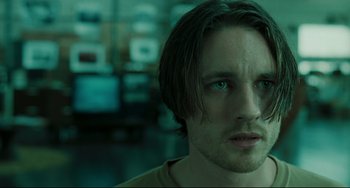 Movie still from “The Ring” (2002), directed by Gore Verbinski – A person with long dark hair; Close Up shot, Over the shoulder angle