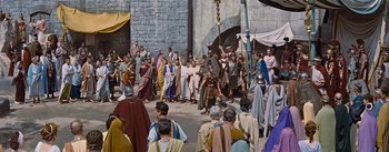 Movie still from “The Robe” (1953), directed by Henry Koster – A group of people dressed in ancient roman clothing; Extreme Wide shot, High angle