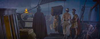 Movie still from “The Robe” (1953), directed by Henry Koster – A group of people walking on a platform; Wide shot, High angle