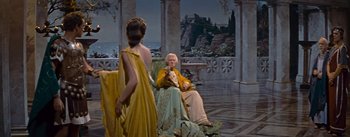 Movie still from “The Robe” (1953), directed by Henry Koster – A man and a woman dressed in ancient roman garb; Wide shot, Over the shoulder angle