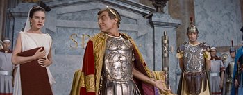 Movie still from “The Robe” (1953), directed by Henry Koster – A man dressed as a roman soldier in a costume; Medium shot, Low angle