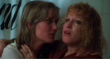 Movie still from “The Rose” (1979), directed by Mark Rydell – Two women looking at one another with tears in their eyes; Close Up shot, High angle