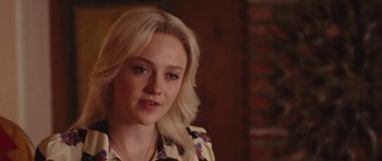 Movie still from “The Runaways” (2010), directed by Floria Sigismondi – A person with blonde hair; Close Up shot, Over the shoulder angle