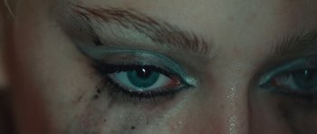 Movie still from “The Runaways” (2010), directed by Floria Sigismondi – A woman's eye with blue eye shadow; Extreme Close Up shot, Overhead angle