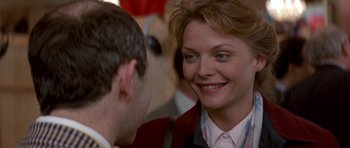 Movie still from “The Russia House” (1990), directed by Fred Schepisi – A person talking to another person; Close Up shot, Over the shoulder angle