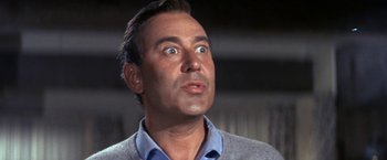 Movie still from “The Russians Are Coming the Russians Are Coming” (1966), directed by Norman Jewison – An older man with a surprised look on his face; Close Up shot, Low angle