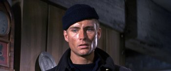 Movie still from “The Russians Are Coming the Russians Are Coming” (1966), directed by Norman Jewison – A person wearing a hat; Close Up shot, Low angle