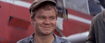 Movie still from “The Russians Are Coming the Russians Are Coming” (1966), directed by Norman Jewison – A person wearing a hat; Close Up shot, Low angle