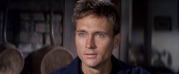 Movie still from “The Russians Are Coming the Russians Are Coming” (1966), directed by Norman Jewison – A person with blue eyes; Close Up shot, Over the shoulder angle